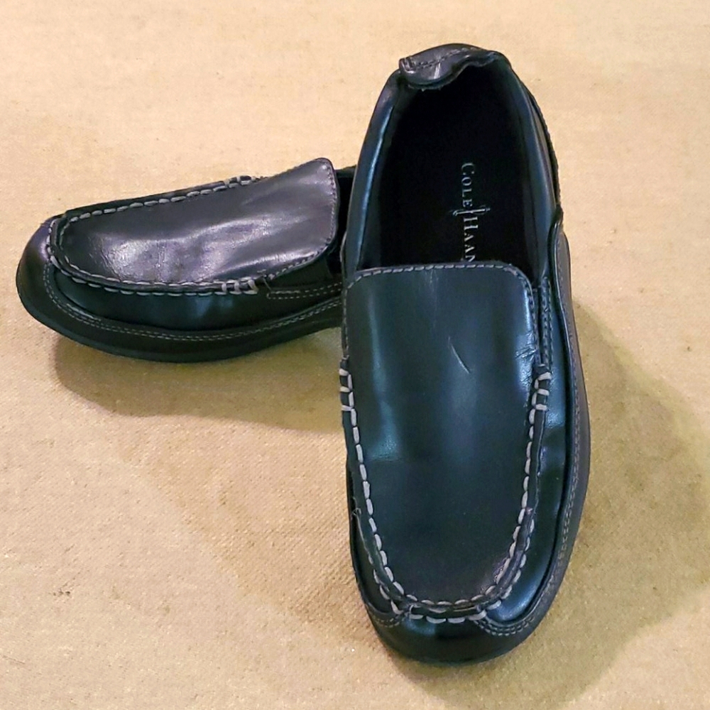 Black Cole Haan slip on shoes
